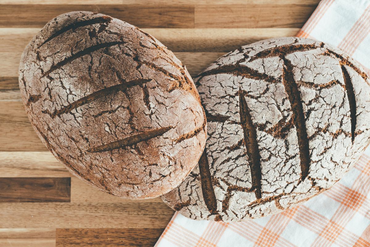 Traditional German sourdough rye bread cooling on rack