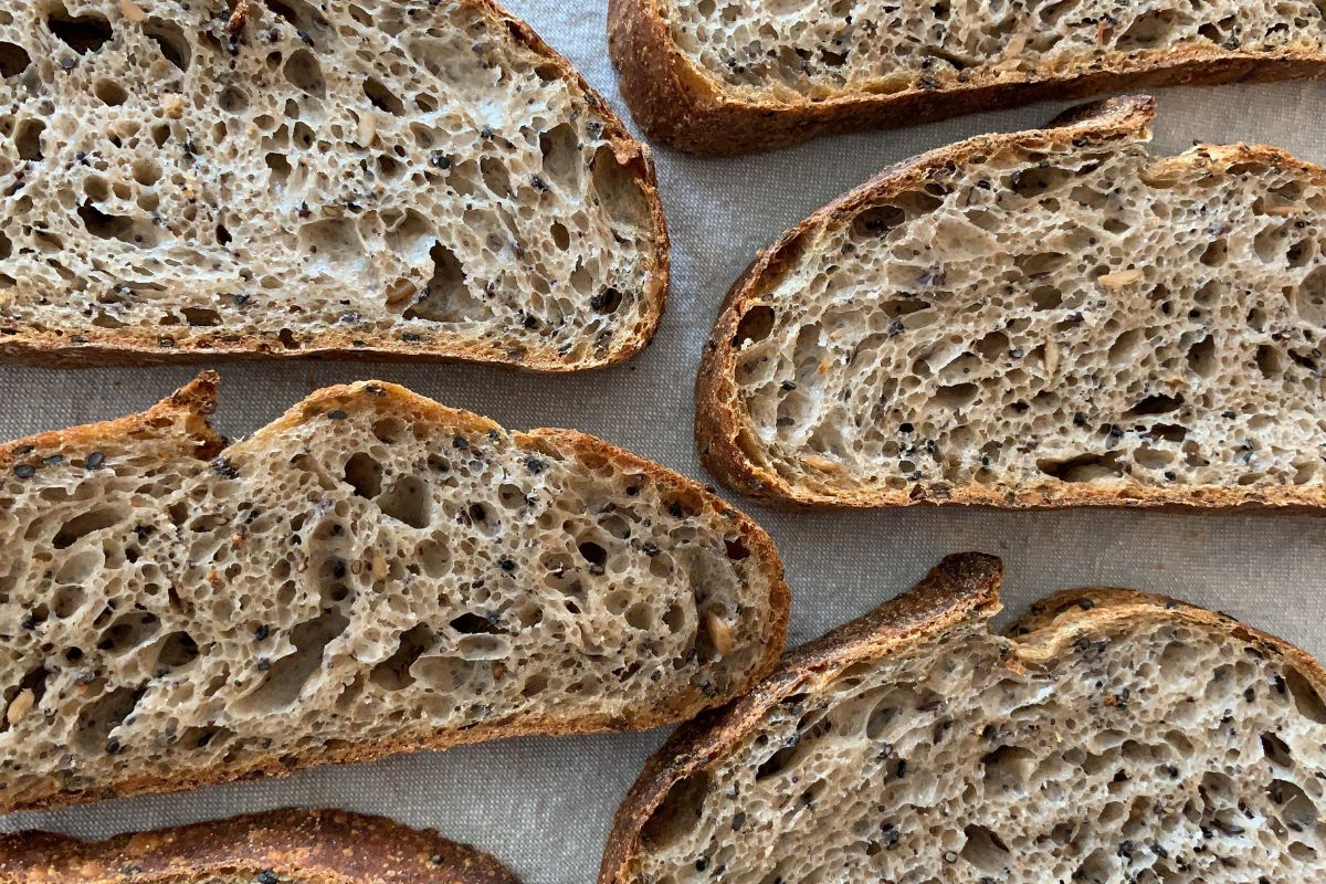 Sourdough bread health benefits - sliced sourdough on cutting board