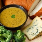 Broccoli cheddar soup served with crusty bread and a side salad