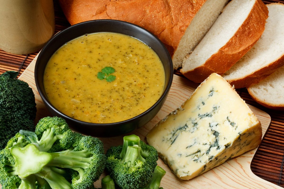 Broccoli cheddar soup served with crusty bread and a side salad