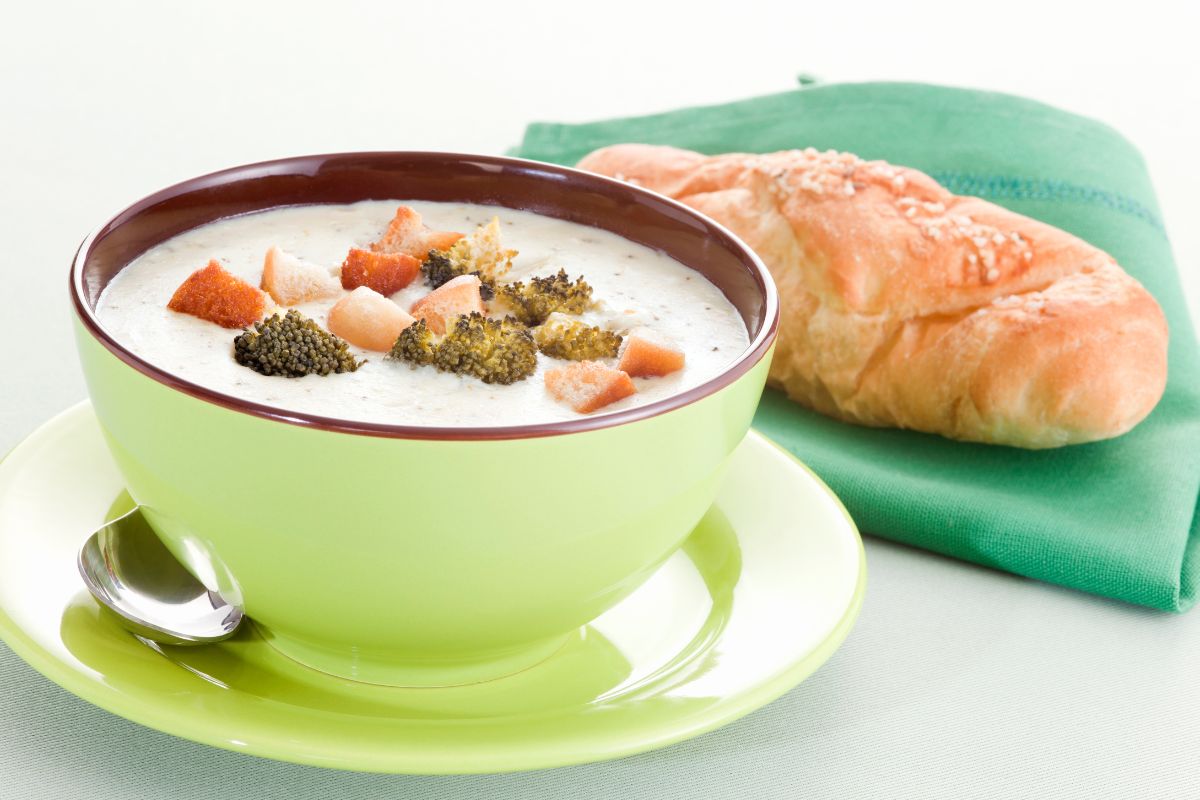 Broccoli cheddar soup served with crusty bread and a side salad