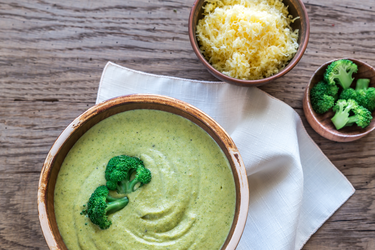 Pretzel bread paired with a bowl of broccoli and cheese soup