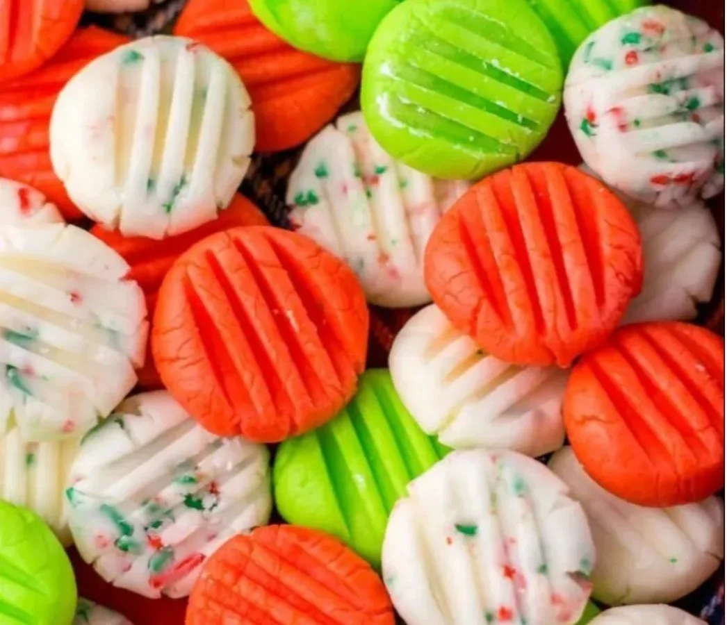 Homemade cream cheese mints on a decorative plate