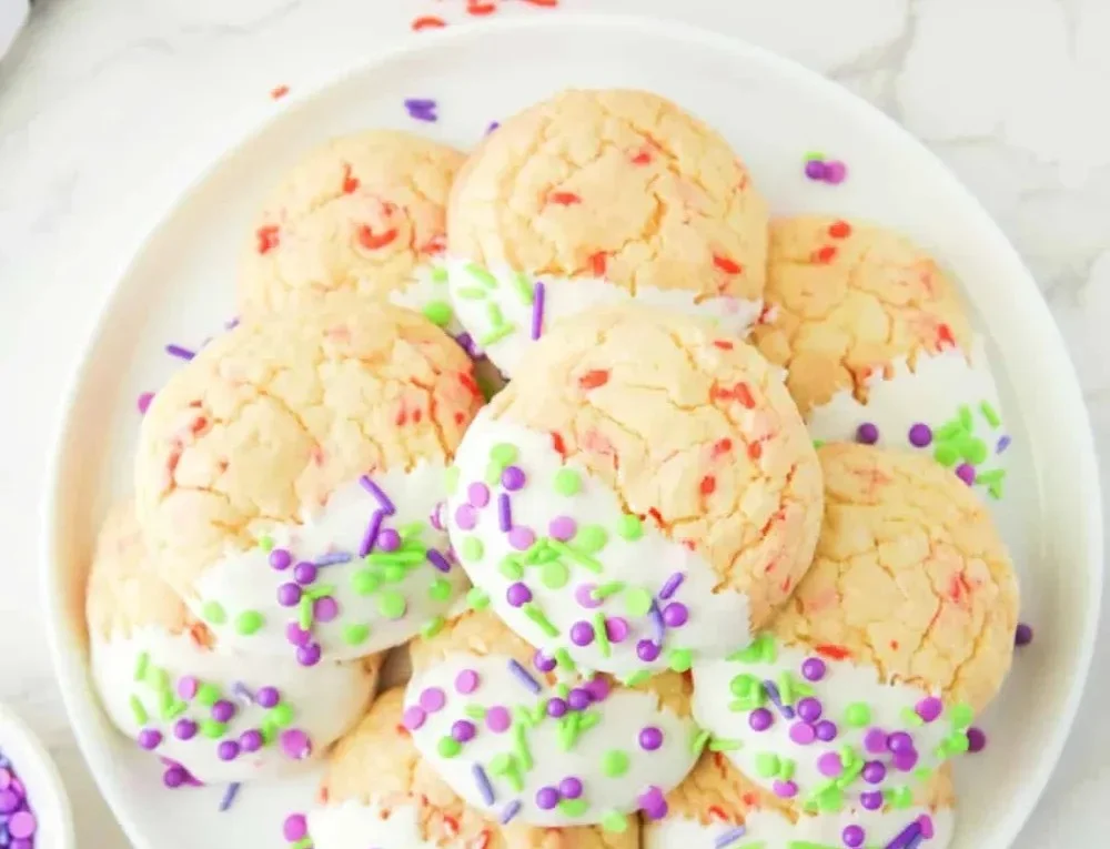 Colorful Halloween Cake Mix Sprinkle Cookies topped with festive sprinkles.