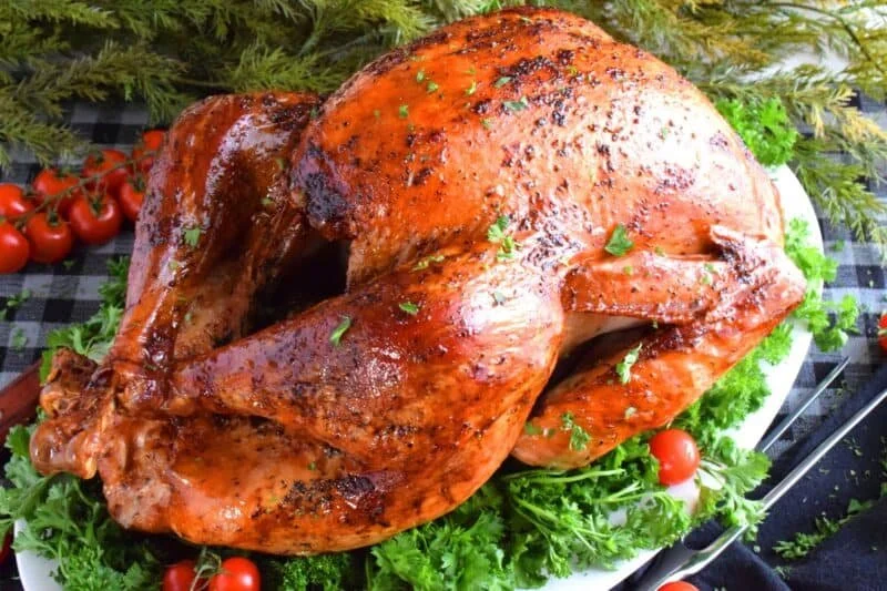 Perfectly cooked whole roasted turkey ready for a festive meal