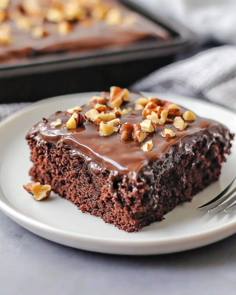 Delicious homemade chocolate sheet cake topped with chocolate frosting