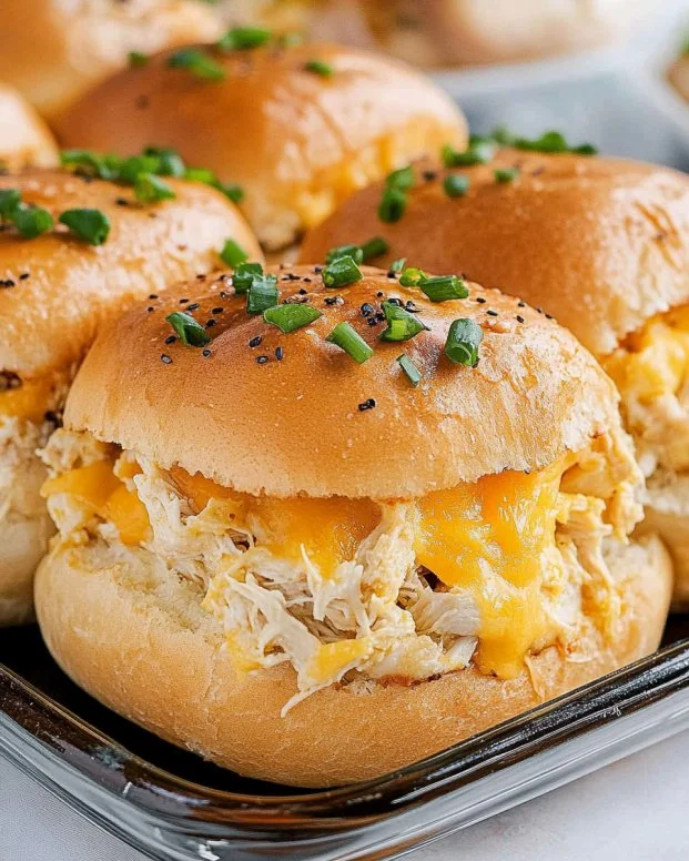 Crack Chicken Sliders served on a platter with garnishes